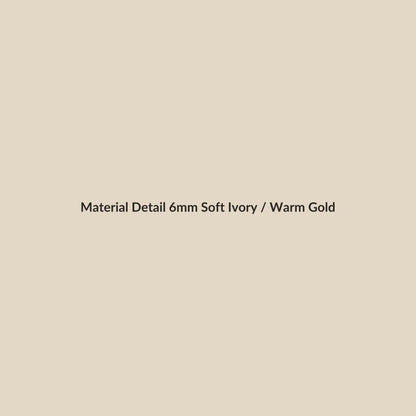 Gilded Pebble White Jade & Gold material detail – white-jade-style beads with restrained polished gold-tone spacers