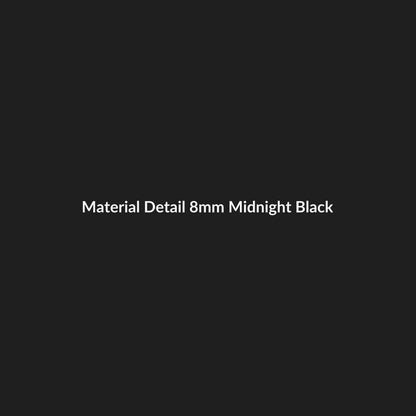Nocturne Black Onyx material detail – polished black onyx-style stone beads with a dark-tone spacer detail